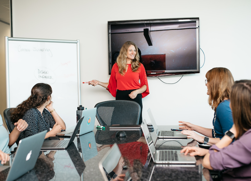 Wendy Covey presenting in a meeting