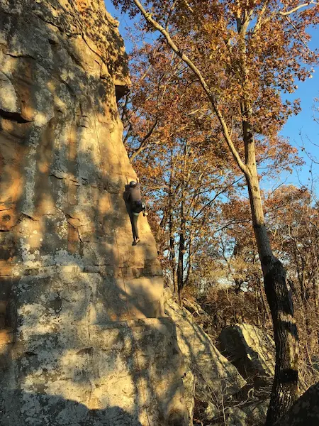 Erin Moore rock climbing in Arkansas